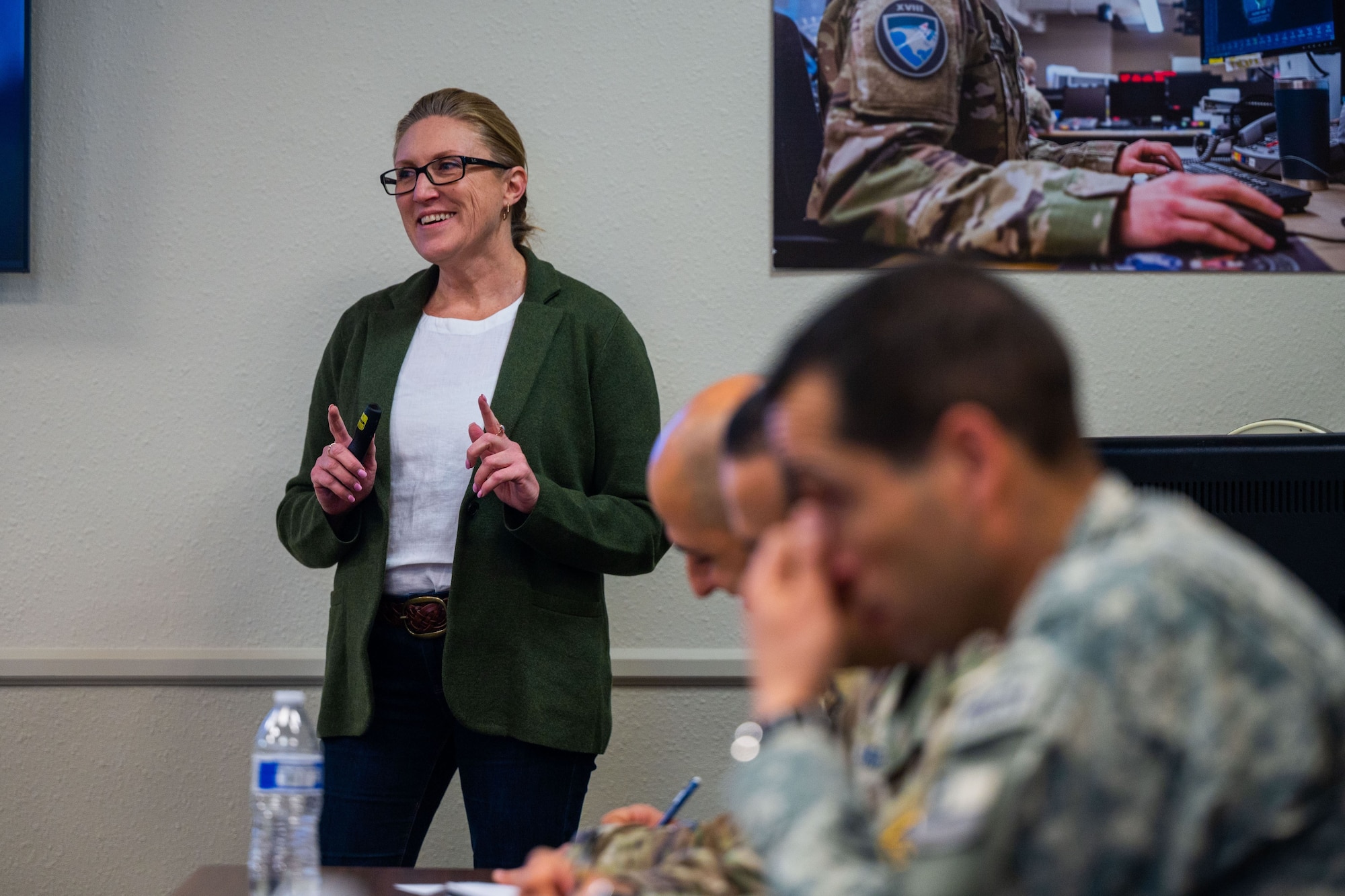 Diana McKissock, Space Delta 2’s Space Domain Awareness Partnership and Coalition Engagement (SPACE) office lead, right, briefs members of the Chilean Air Force at the 18th Space Defense Squadron on Vandenberg Space Force Base, Calif., Sept. 14, 2023. The Combined Force Space Component Command hosted a delegation from partner nation Chile with discussions focused on SDA, aiming to increase the understanding and benefits of existing Space Situational Awareness sharing agreements, interoperability, and integration (U.S. Space Force photo by Tech. Sgt. Luke Kitterman)