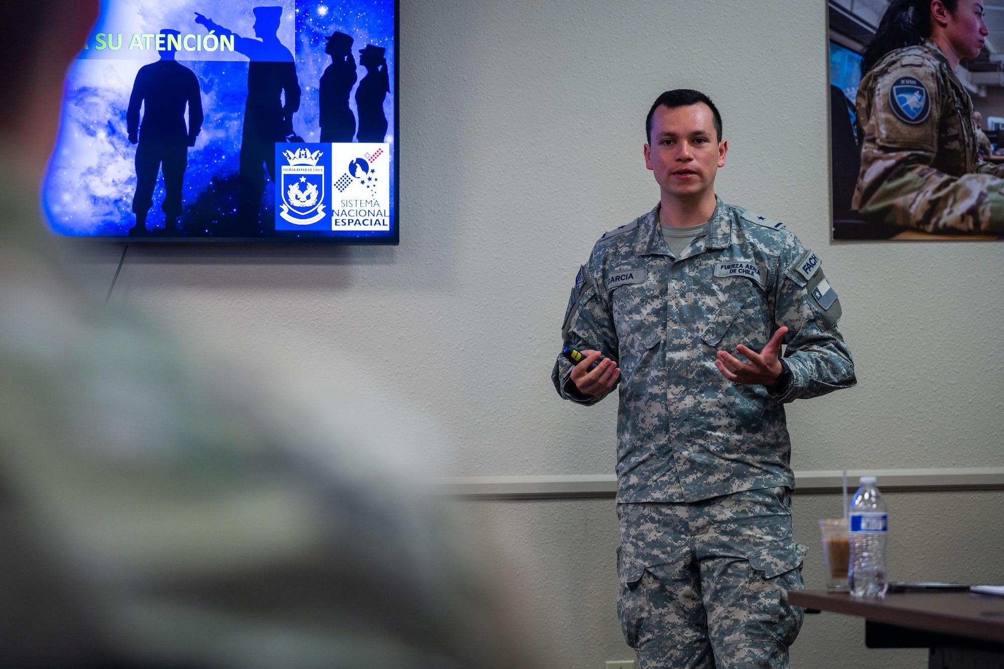 Chilean Air Force 2nd Lt. Diego Garcia Gallegos, Space Operations Group, briefs Chilean space capabilities and organizational structure to members of the 18th Space Defense Squadron and U.S. Southern Command during an immersion on Vandenberg Space Force Base, Calif., Sept. 14, 2023. The Combined Force Space Component Command hosted a delegation from partner nation Chile with discussions focused on Space Domain Awareness, aiming to increase the understanding and benefits of existing Space Situational Awareness sharing agreements, interoperability, and integration (U.S. Space Force photo by Tech. Sgt. Luke Kitterman)