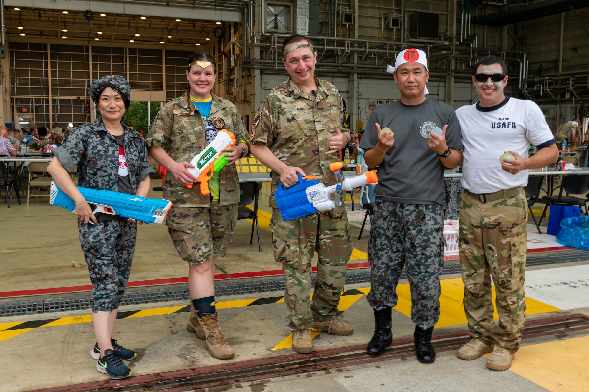 Leaders from the 374th Mission Support Group and Japan Air Self-Defense Force pose for a photo during a combat dining-in.