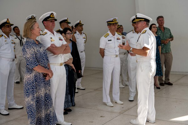 Adm. Samuel Paparo, commander, U.S. Pacific Fleet, right, explains the significance of the USS Arizona shrine wall to the Malabar navies’ leadership during a tour of the Memorial. Adm. Paparo hosted Adm. R. Hari Kumar, chief of naval staff, Indian Navy; Vice Adm. Mark Hammond, chief of navy, Royal Australian Navy; and Adm. Ryo Sakai, chief of staff, Japan Maritime Self-Defense Force, for a multilateral engagement in Pearl Harbor, Hawaii, Sept. 17, 2023. The four navies, all participants of the Malabar exercise, met prior to the U.S.-led International Seapower Symposium to reinforce security through partnership in the Indo-Pacific. (U.S. Navy photo by Mass Communication Specialist 2nd Class Jeremy R. Boan)