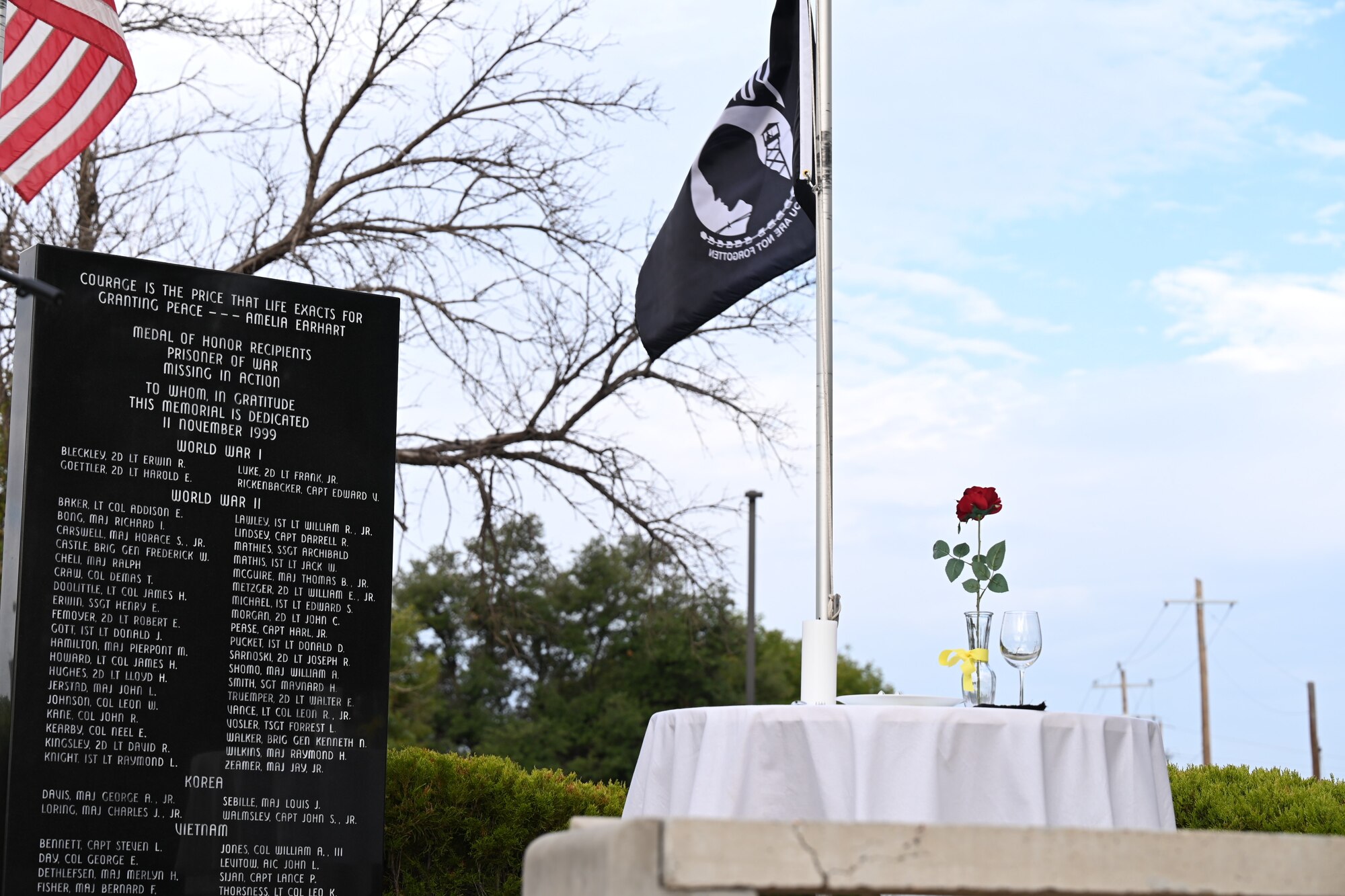 A Prisoner of War/Missing in Action table displayed during the POW/MIA Recognition Day closing ceremony at the POW/MIA/Medal of Honor Memorial, Goodfellow Air Force Base, Texas, Sept. 15, 2023. The event included an opening ceremony, a 24-hour run and a closing ceremony for POW/MIA Recognition Day.