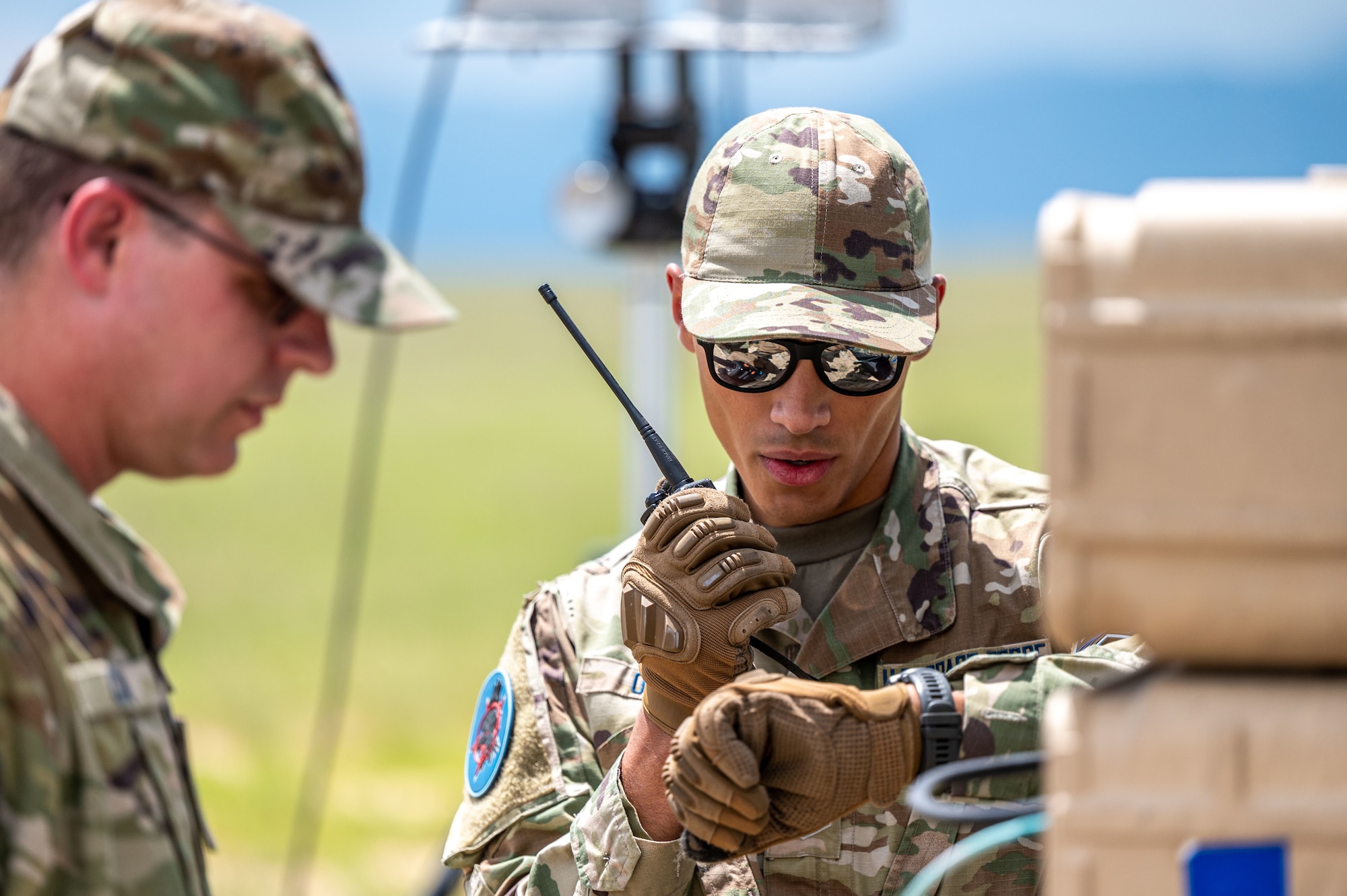 U.S. Space Force Sgt. Jonathan Ojeda, 527th Space Aggressor Squadron (SAS), right, conducts Global Positioning System (GPS) electromagnetic interference training with a GPS electromagnetic attack system at Schriever Space Force Base, Colorado, July 18, 2023. The 527th SAS’s mission is to know, teach, and replicate modern, emerging, and integrated space threats in order to prepare service, joint, and coalition forces to fight in and through a Contested, Degraded, and Operationally-limited (CDO) environment. (U.S. Space Force photo by Ethan Johnson)