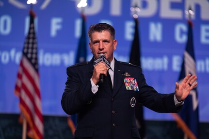 U.S. Air Force Brig. Gen. Christopher Amrhein, Air Force Recruiting Service commander, makes remarks at the Air and Space Forces Association's Air, Space & Cyber Conference in National Harbor, Md., Sept. 11, 2023.