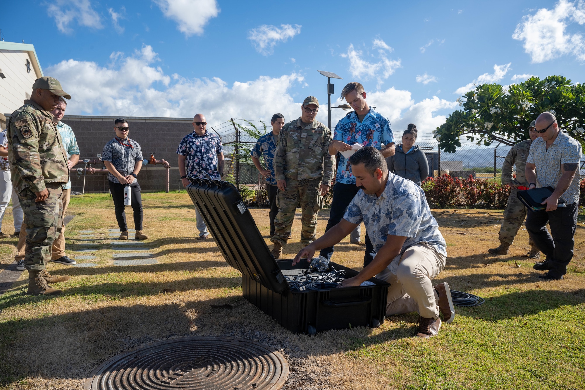 Master Sgt. Robert Phillips, 15th Maintenance Squadron production superintendent, demonstrates how to set up the commercial satellite kit at Joint Base Pearl Harbor-Hickam, Hawaii, August 11, 2023. The 15th MXS trained in setting up and tearing down the kit, a tool that provides high-speed internet and connectivity improving communications and allows Airmen to communicate back to the 15th Maintenance Group from anywhere around the globe. (U.S. Air Force photo by Senior Airman Makensie Cooper)