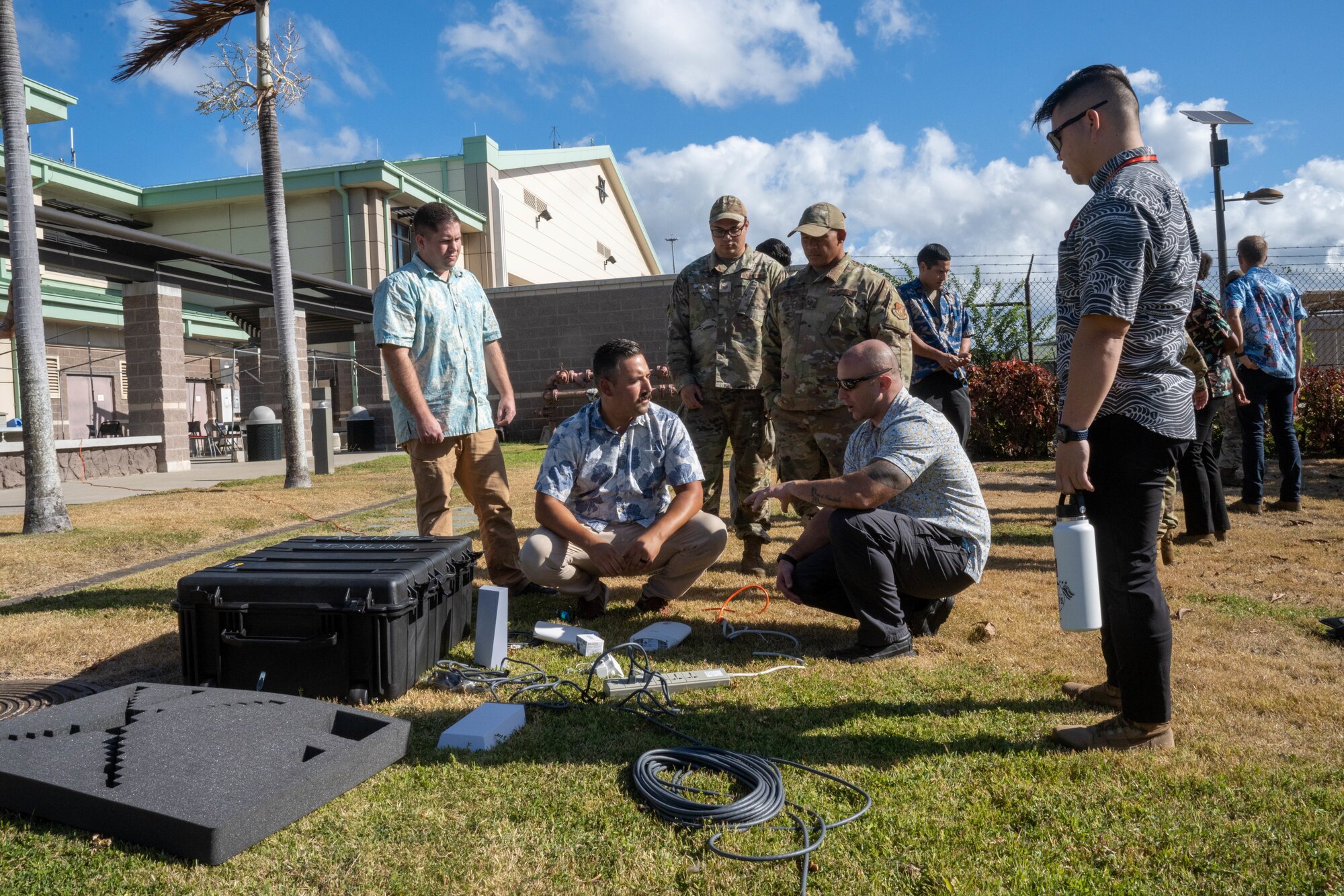 Master Sgt. Robert Phillips, 15th Maintenance Squadron production superintendent, briefs Airmen assigned to the 15th MXS how to set up a commercial satellite kit at Joint Base Pearl Harbor-Hickam, Hawaii, August 11, 2023. The 15th MXS trained in setting up and tearing down the kit, a tool that provides high-speed internet and connectivity improving communications and allows Airmen to communicate back to the 15th Maintenance Group from anywhere around the globe. (U.S. Air Force photo by Senior Airman Makensie Cooper)