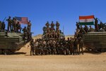 U.S. Marines from the 3rd Amphibious Assault Battalion, 1st Marines, celebrate the end of a live fire exercise with Indian Army soldiers during exercise Bright Star 2023 in Egypt, Sept. 10, 2023.