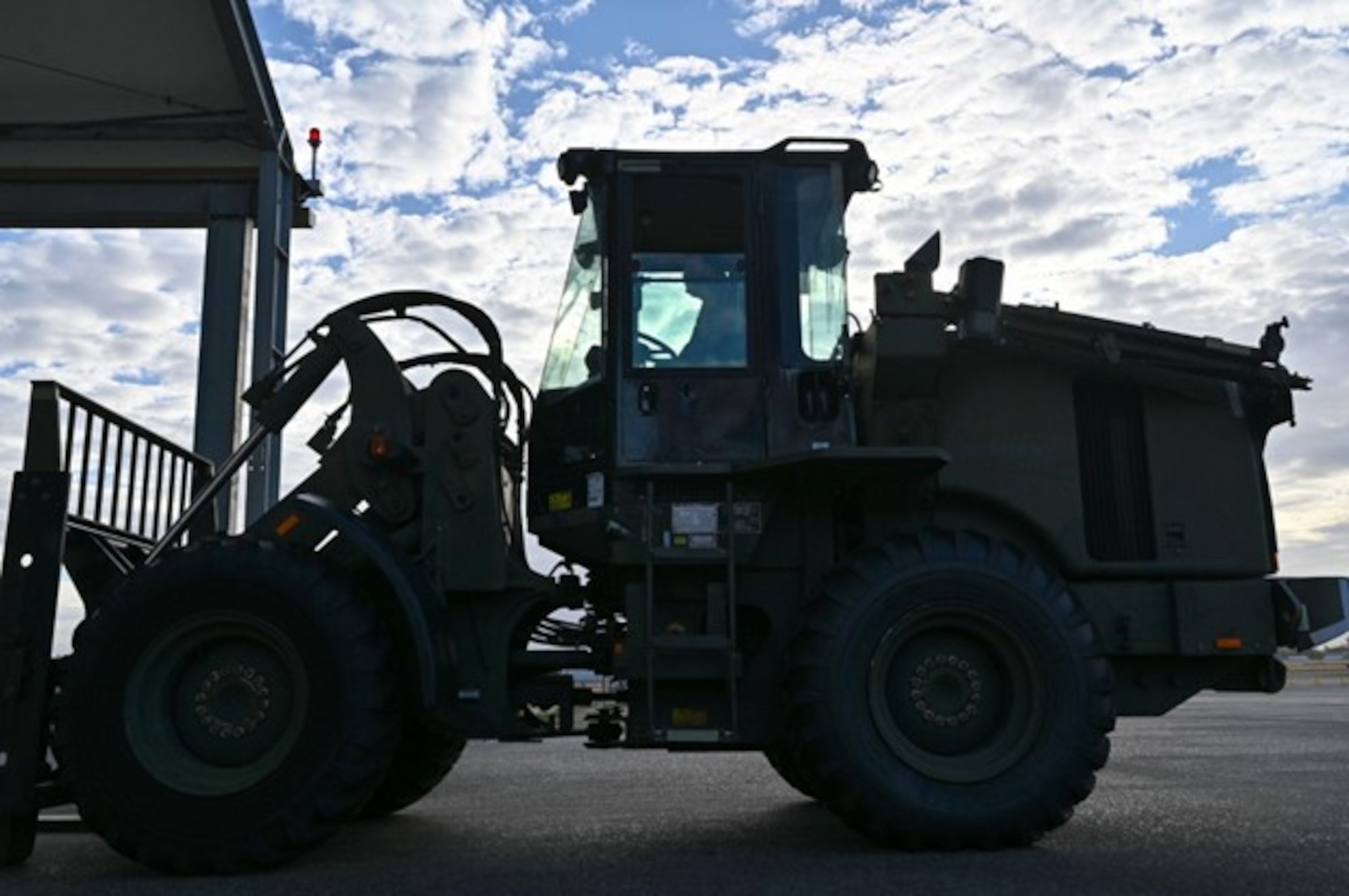 U.S. Air Force Staff Sgt. Derek Bright, 62d Logistics Readiness Squadron ground transportation, uses a forklift to move cargo during Exercise Rainier War 23A at Joint Base Lewis-McChord, Washington, Sept. 19, 2023. Rainier War is an exercise led by the 62d Airlift Wing designed to evaluate the ability to generate, employ and sustain in-garrison and forward deployed forces. These exercises are necessary in assessing and maintaining wartime operational tempos, ensuring command and control across multiple locations. During the exercise, Airmen will respond to scenarios that replicate today’s contingency operations and will address full-spectrum readiness against modern threats brought on by peer adversaries. (U.S. Air Force photo by Senior Airman Colleen Anthony)