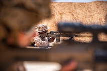 A U.S. Marine with Fleet Anti-terrorism Security Team Central Command fires his weapon system at a target while participating in a designated marksman range during exercise Bright Star 23 at Mohamed Naguib Military Base (MNMB), Egypt, Sept. 3, 2023. Bright Star 23 is a multilateral U.S. Central Command exercise held with the Arab Republic of Egypt across air, land, and sea domains that promotes and enhances regional security and cooperation, and improves interoperability in irregular warfare against hybrid threat scenarios. (U.S. Marine Corps Photo by Staff Sgt. Victor Mancilla)