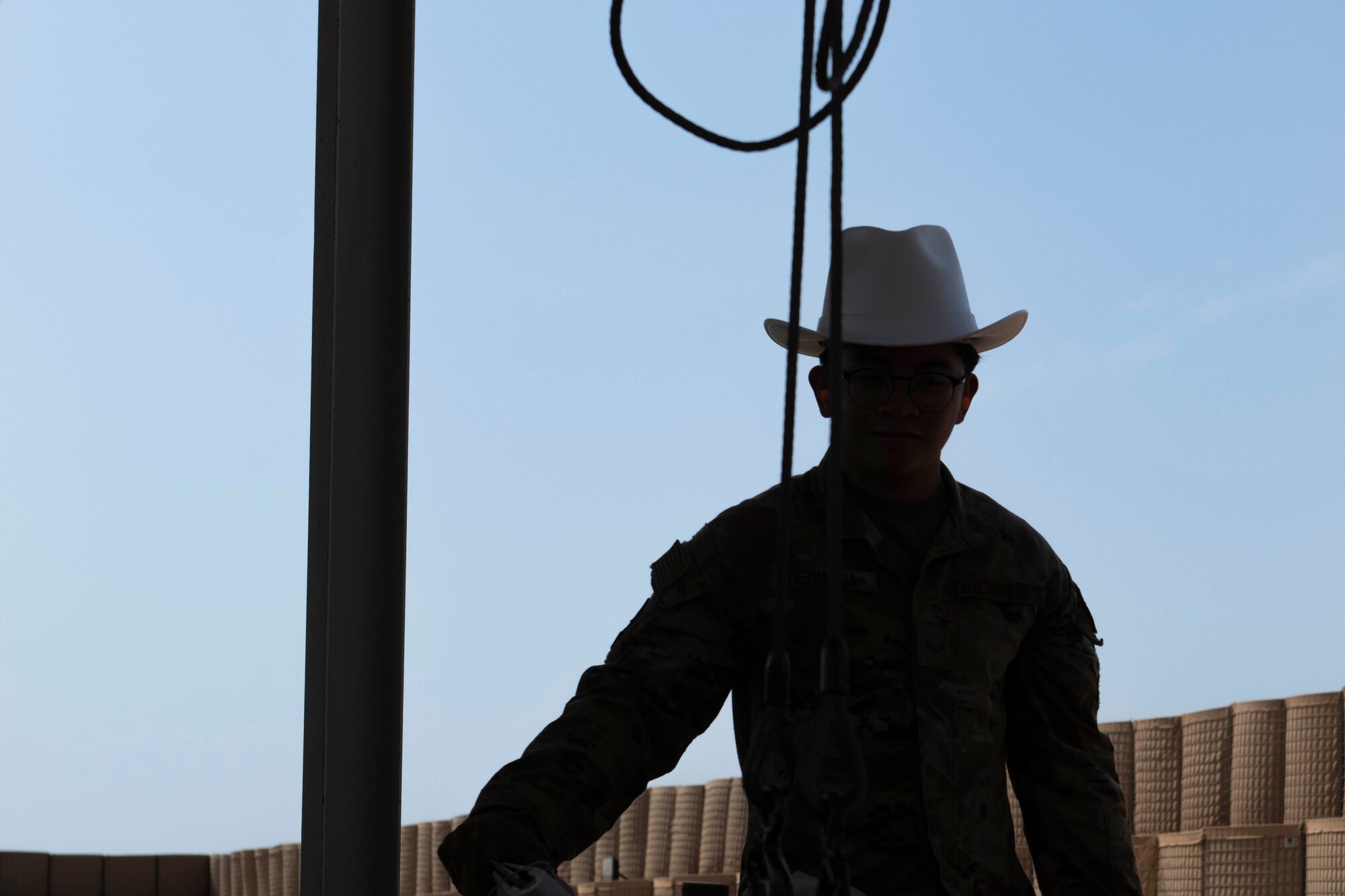 Photo of a man wearing a cowboy hard hat
