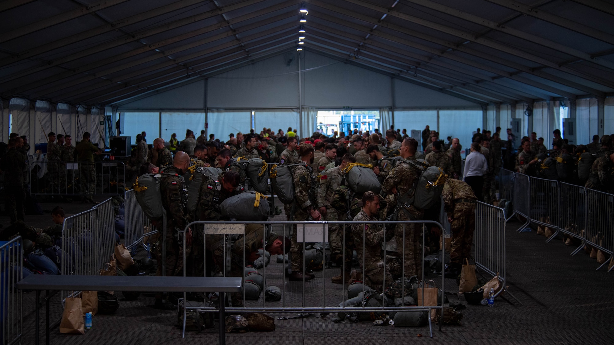 Jumpers from around Europe gather in preparation for a nine aircraft formation during Operation Market Garden memorial flight over the Netherlands