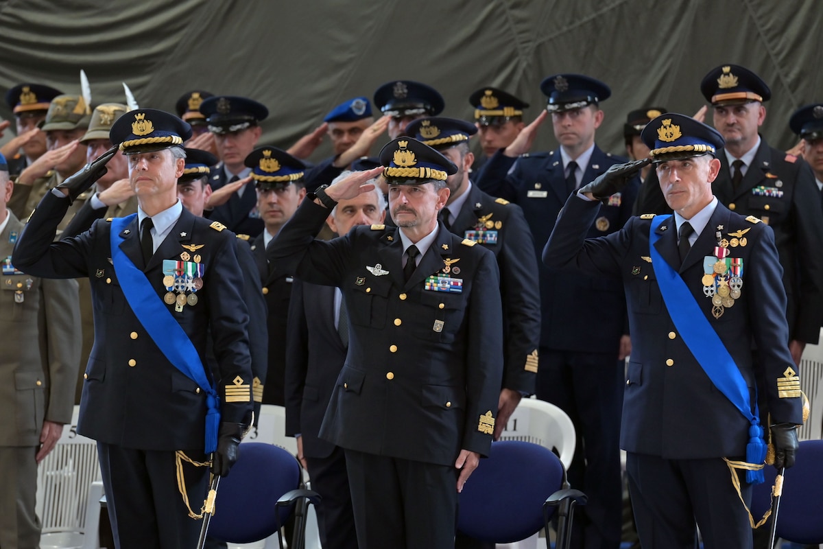 3 men saluting