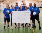 Volleyball team poses for photo