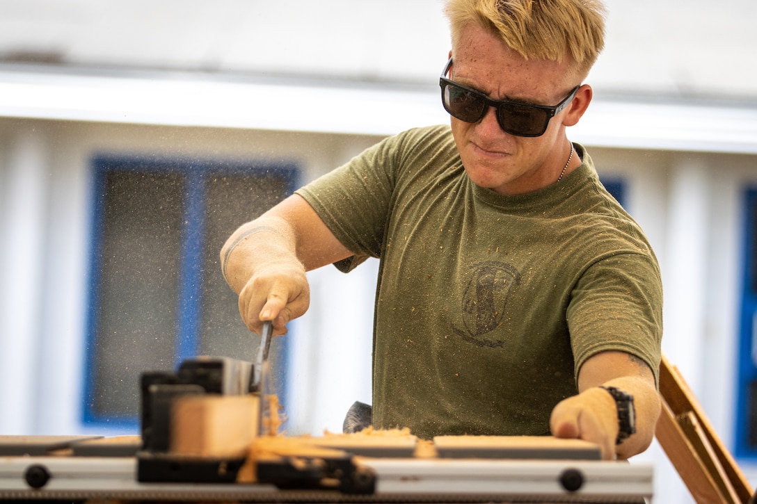 U.S. Marine Corps Lance Cpl. Ashton Struck, a native of Alexandria, Minnesota and a combat engineer with Task Force Koa Moana 23, operates a power saw during a renovation project at the Dr. Arthur P. Sigrah Memorial Hospital on Tofol, Kosrae, Federated States of Micronesia, Sept. 6, 2023. Task Force Koa Moana 23, composed of U.S. Marines and Sailors from I Marine Expeditionary Force, deployed to the Indo-Pacific to strengthen relationships with Pacific Island partners through bilateral and multilateral security cooperation and community engagements.
