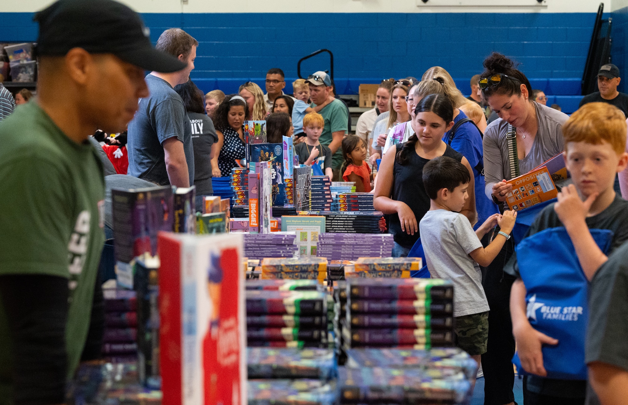 Military families line up to pick out from over 3000 donated books