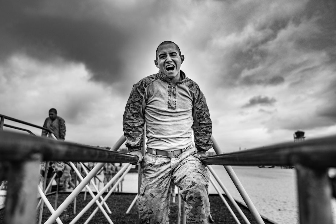 U.S. Marine Corps recruit Brody Smith, with Golf Company, 2nd Recruit Training Battalion, navigates an obstacle during a confidence course event at Marine Corps Recruit Depot San Diego, Sept. 18, 2023.