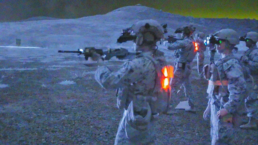 U.S. Marines with 1st Air Naval Gunfire Liaison Company, I Marine Expeditionary Force Information Group, fire at night during ANGLICO Basic Skills Package at Marine Corps Base Camp Pendleton, California, Sept. 15, 2023. The goal of the Basic Skills Package is to provide ANGLICO detachments with advanced training on infantry skills, machine gun employment, Helicopter Rope Suspension Technique, digital communication, and fires planning at the battalion operational level. (U.S. Marine Corps photo by Lance Cpl. Brandon Marrero)
