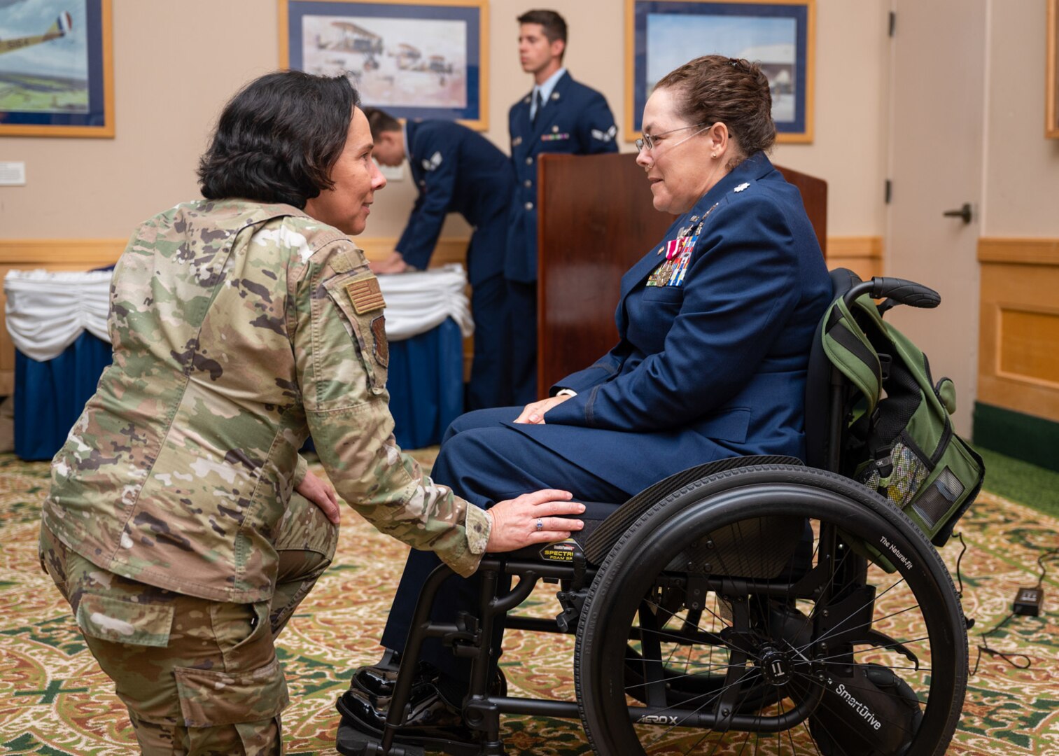 Brig. Gen. Jeannine Ryder, 59th Medical Wing commander, gives her support and well wishes to Lt. Col. (ret.) Dana Duerr, who recently served as Senior Program Manager of the Nurse Corps Education and Training Program at Air Force Medical Readiness Agency, during her retirement ceremony in the Gateway Club at Joint Base San Antonio-Lackland, Texas, Aug. 30, 2023. The Airman Medical Transition Unit has provided leadership, administrative support and comprehensive transition planning during Duerr’s care. (U.S. Air Force photo by Senior Airman Melody Bordeaux)