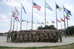 The 2023 International Senior Non-Commissioned Officer Development course class pose for a photograph in front of the Inter-American Air Forces Academy on Joint Base San Antonio-Lackland, Texas, September 18, 2023. The INLEAD course is held every summer, sponsored by the International Air Reserve Symposium (IARS) which was established in 1992. The location is changed every five years to allow participants to experience the military heritage of different host nations, while learning leadership development in an international integrated environment. (U.S. Air Force photo by Senior Airman Brittany Wich)