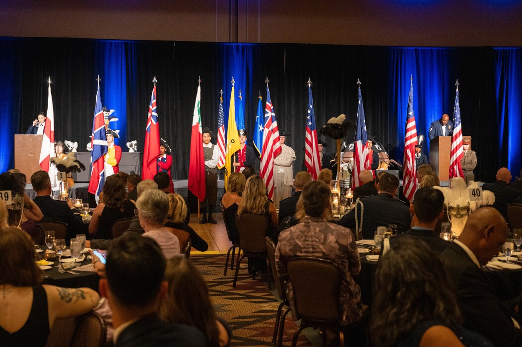 Cadets of the Buckeye High School JROTC program perform the Pageant of the Flags ceremony during the 76th Air Force Ball, Sept. 16, 2023, at the Wigwam Resort, Litchfield Park, Arizona.