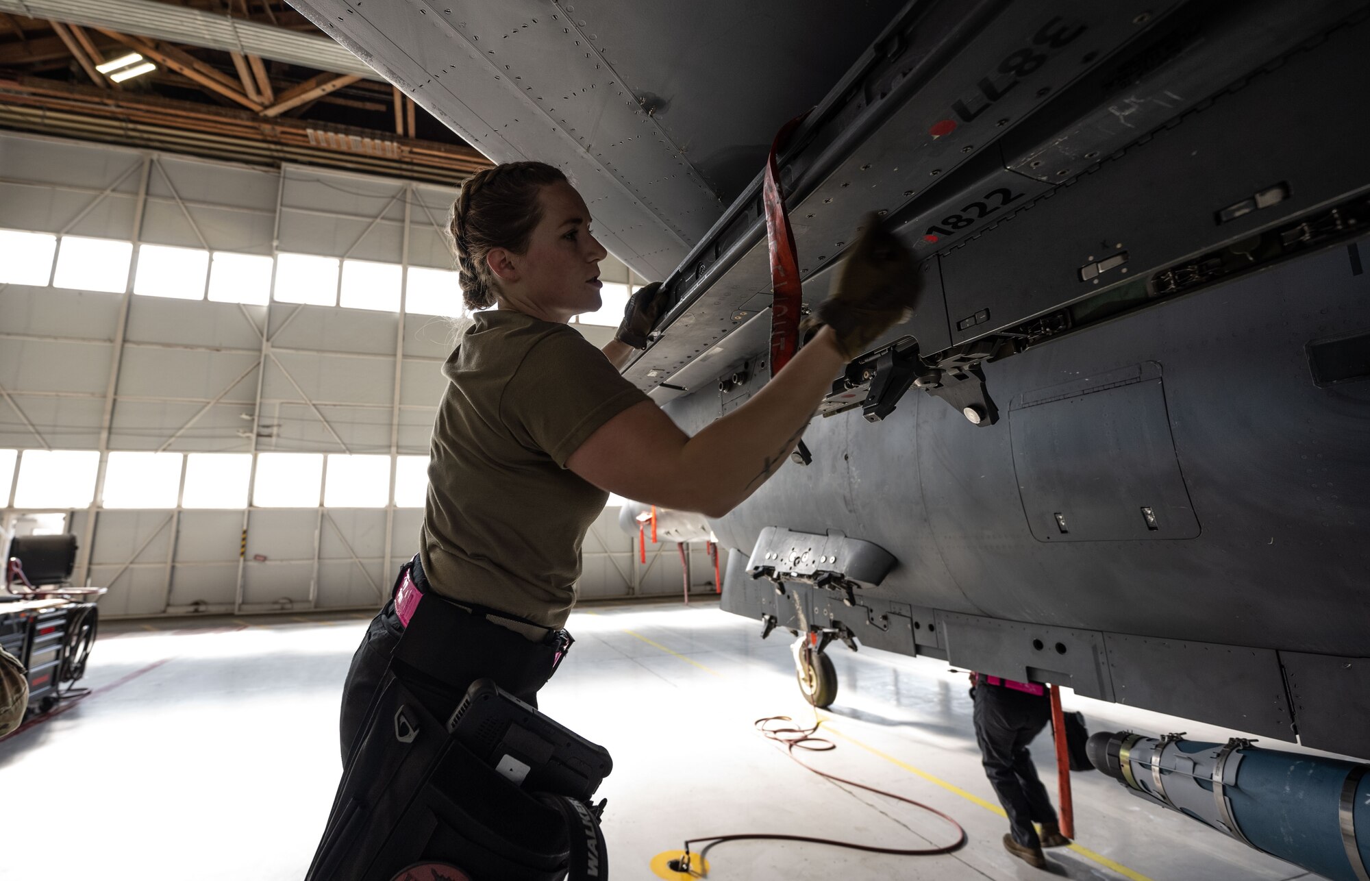 Photo of Airman working on F-15E Strike Eagle