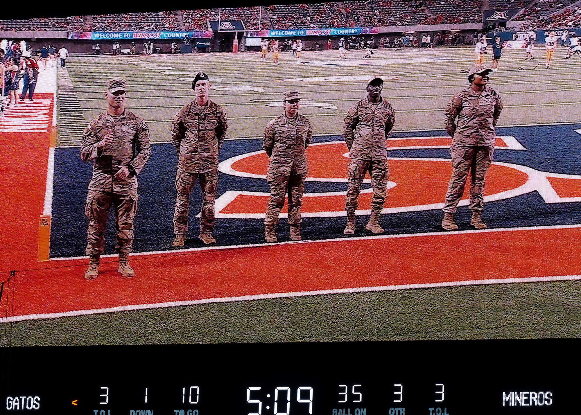 Airmen from Davis-Monthan Air Force Base are recognized on the University of Arizona football stadium in Tucson, Ariz., Sept. 16, 2023 The Airmen were recognized during halftime for their achievements in service. (U.S. Air Force photo by Airman 1st Class Robert Allen Cooke III)