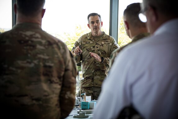 The 7th Transportation Brigade (Expeditionary) Commander Col. Samuel Miller briefs senior Army leaders on the Joint Logistics Over-the-Shore operation during Talisman Sabre 2023 in Bowen, Australia, July 31, 2023. JLOTS demonstrates the critical capability of bringing vehicles and equipment to the shore in austere environments or when port facilities are unavailable. Talisman Sabre is the largest bilateral military exercise between Australia and the United States, with multinational participation, advancing a free and open Indo-Pacific by strengthening relationships and interoperability among key allies and enhancing our collective capabilities to respond to a wide array of potential security concerns.