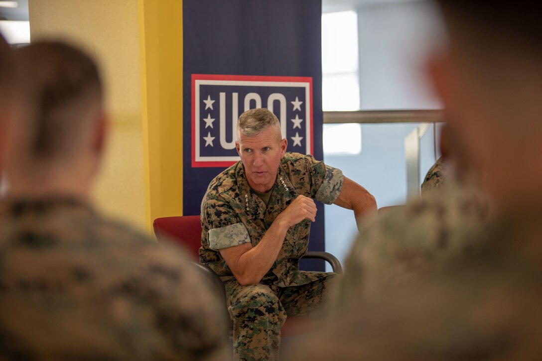 The 36th Assistant Commandant of the Marine Corps, Gen. Eric M. Smith, answers questions and engages with Marines and Sailors at the USO on Marine Corps Air Station Iwakuni, Japan, Sept. 12, 2023. During the visit, Gen. Smith met with Marines and Sailors to answer questions pertaining to improving the quality of life for on-base personnel. (U.S. Marine Corps photo by Lance Cpl. David Getz)