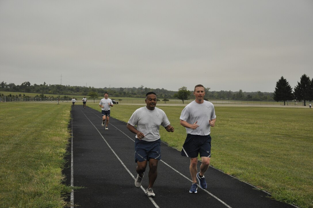 AFLCMC HQ leadership participate in weekly Friday group PT sessions. (USAF photo by 2nd Lt Morgan Searcy).