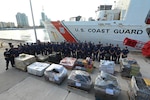 Bales of illegal narcotics, worth an estimated $160 million, are offloaded onto pallets by the U.S. Coast Guard Cutter Confidence (WMEC 619) crew, Sept. 19, 2023, at Coast Guard Base Miami Beach, Florida. Coast Guard and partner agency crews interdicted the illegal narcotics during nine separate cases in the international waters of the Caribbean Sea. (U.S. Coast Guard photo by Petty Officer 3rd Class Santiago Gomez)