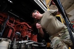 Airman 1st Class Alily Kliewer, 28th Logistics Readiness Squadron light ground vehicle fleet management and analysis technician, receives an oil filter from a placed order, Sept. 8, 2023, at Ellsworth Air Force Base, South Dakota.