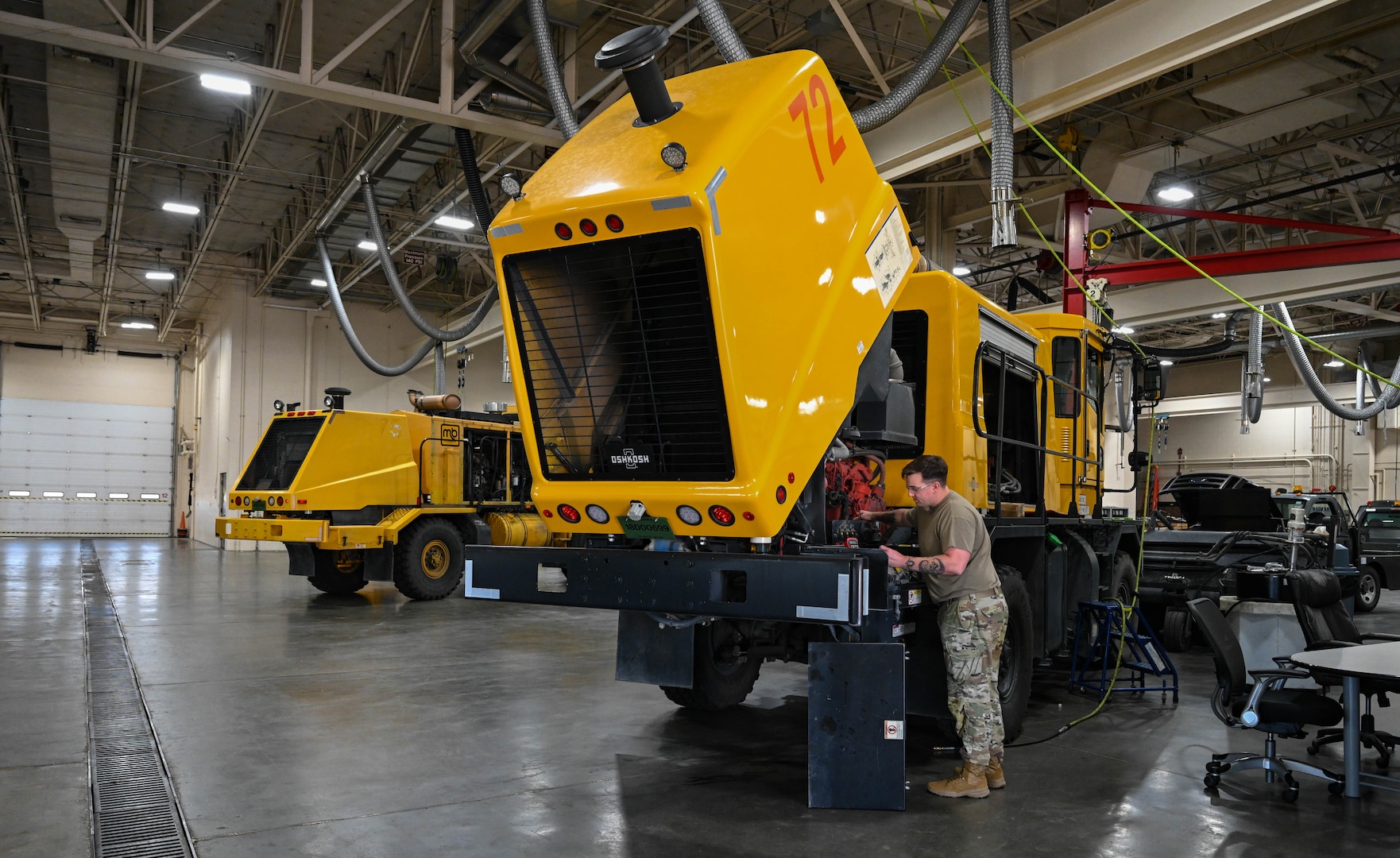 Tech. Sgt. Anthony Tavares, 28th Logistics Readiness Squadron light ground vehicle noncommissioned in charge of special purpose vehicle maintenance, services a flightline snow broom , Sept. 8, 2023, at Ellsworth Air Force Base, South Dakota.