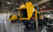 Tech. Sgt. Anthony Tavares, 28th Logistics Readiness Squadron light ground vehicle noncommissioned in charge of special purpose vehicle maintenance, services a flightline snow broom , Sept. 8, 2023, at Ellsworth Air Force Base, South Dakota.