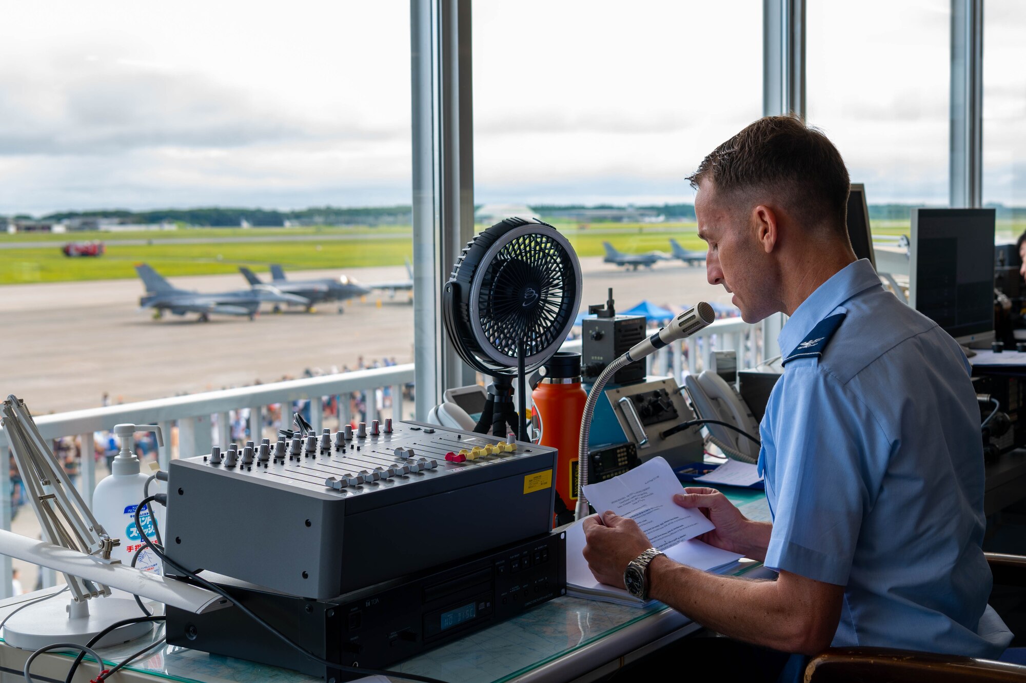 Airman gives remarks to crowd during Misawa Air Fest 2023.