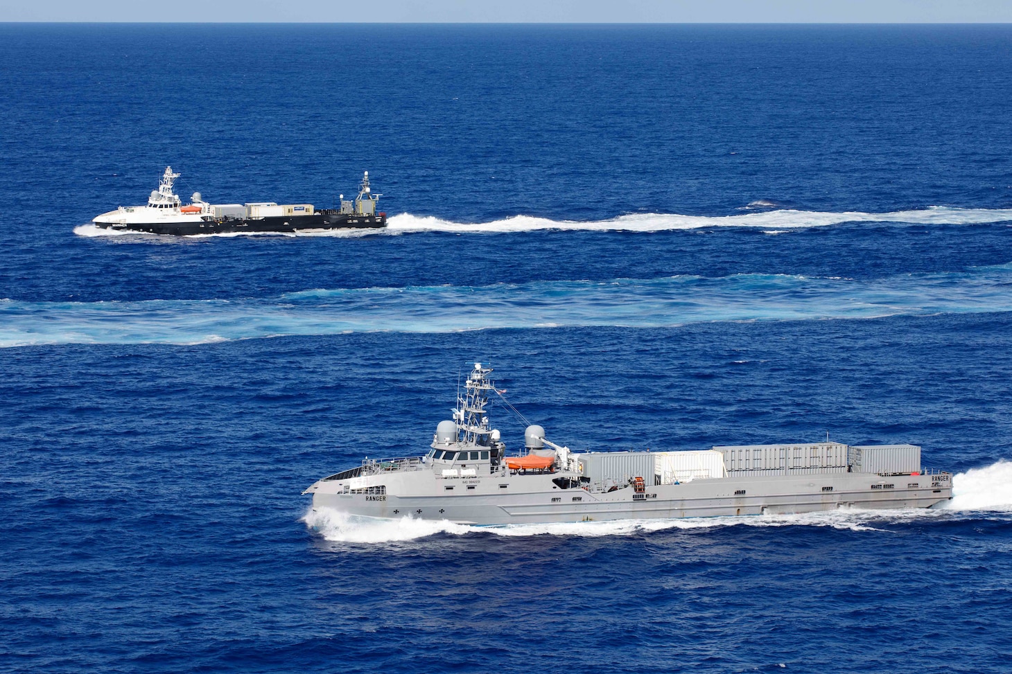 The unmanned surface vessel (USV) Ranger steams alongside the USV Mariner as both ships transit the Pacific Ocean during a photo exercise as part of Integrated Battle Problem (IBP) 23.2, Sep. 7, 2023. IBP 23.2 is a Pacific Fleet exercise to test, develop and evaluate the integration of unmanned platforms into fleet operations to create warfighting advantages. (U.S. Navy photo by Mass Communication Specialist 2nd Class Jesse Monford)