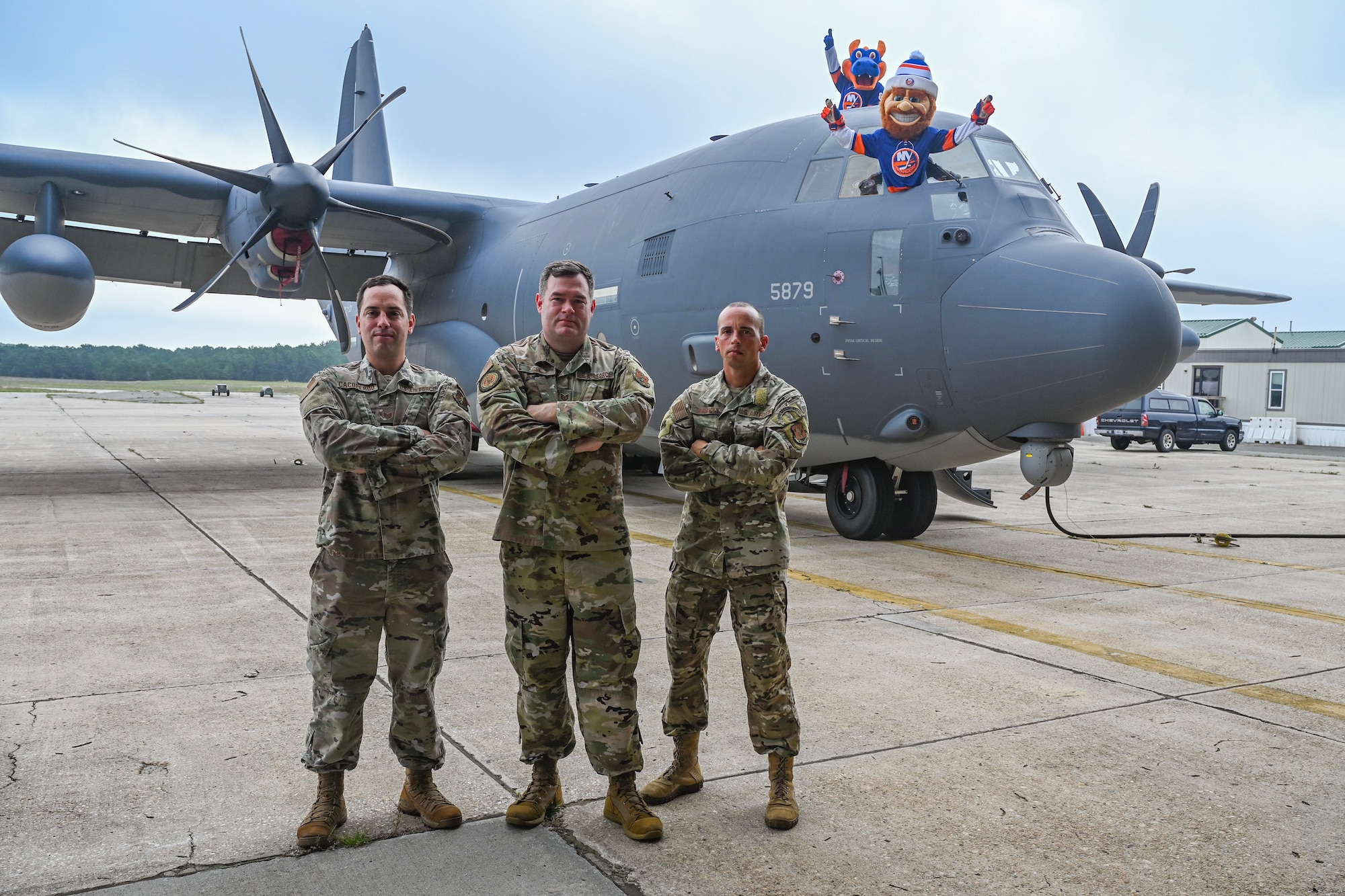 U.S. Air Force recruiters of the 106th Rescue Wing assigned to Francis S. Gabreski Air National Guard Base, Westhampton Beach, New York Air National Guard, poses with Sparky and Nyisles, the mascots of the New York Islanders, a National Hockey League team, on base, September 8, 2023.