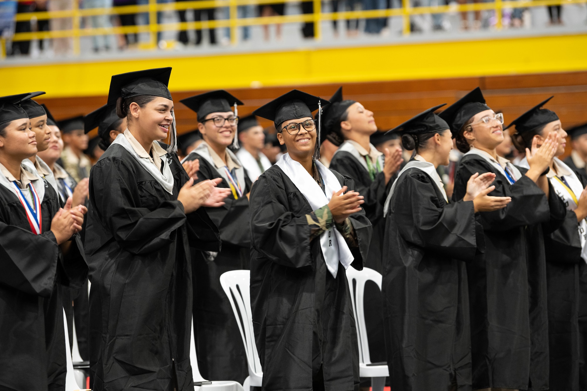 Cadets with the Puerto Rico National Guard Youth ChalleNGe Academy, Class 23-02, celebrate during their graduation ceremony at Pontifical Catholic University of Puerto Rico, Ponce, Puerto Rico, Sept. 15, 2023. More than 220 cadets received their high school diplomas after completing a 22-week PRNG Youth ChalleNGe Academy program, where they studied for their high school diploma and also received vocational education from several career fields. (U.S. Air National Guard photo by 2nd. Lt. Eliezer Soto)