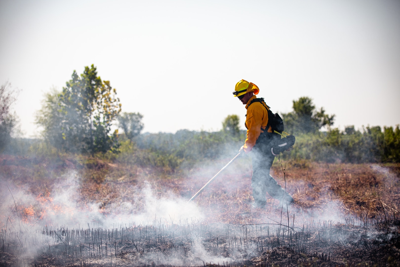 An Oklahoma Army National Guard Soldier constructs a firebreak at the Wildland Firefighting Course at Camp Gruber Training Center, Oklahoma, Aug. 21, 2023. Soldiers volunteered for the course to earn their Red Card Certification and have the knowledge and experience to respond to wildfire incidents both in state and around the nation. (Oklahoma Army National Guard photo by Spc. Danielle Rayon)