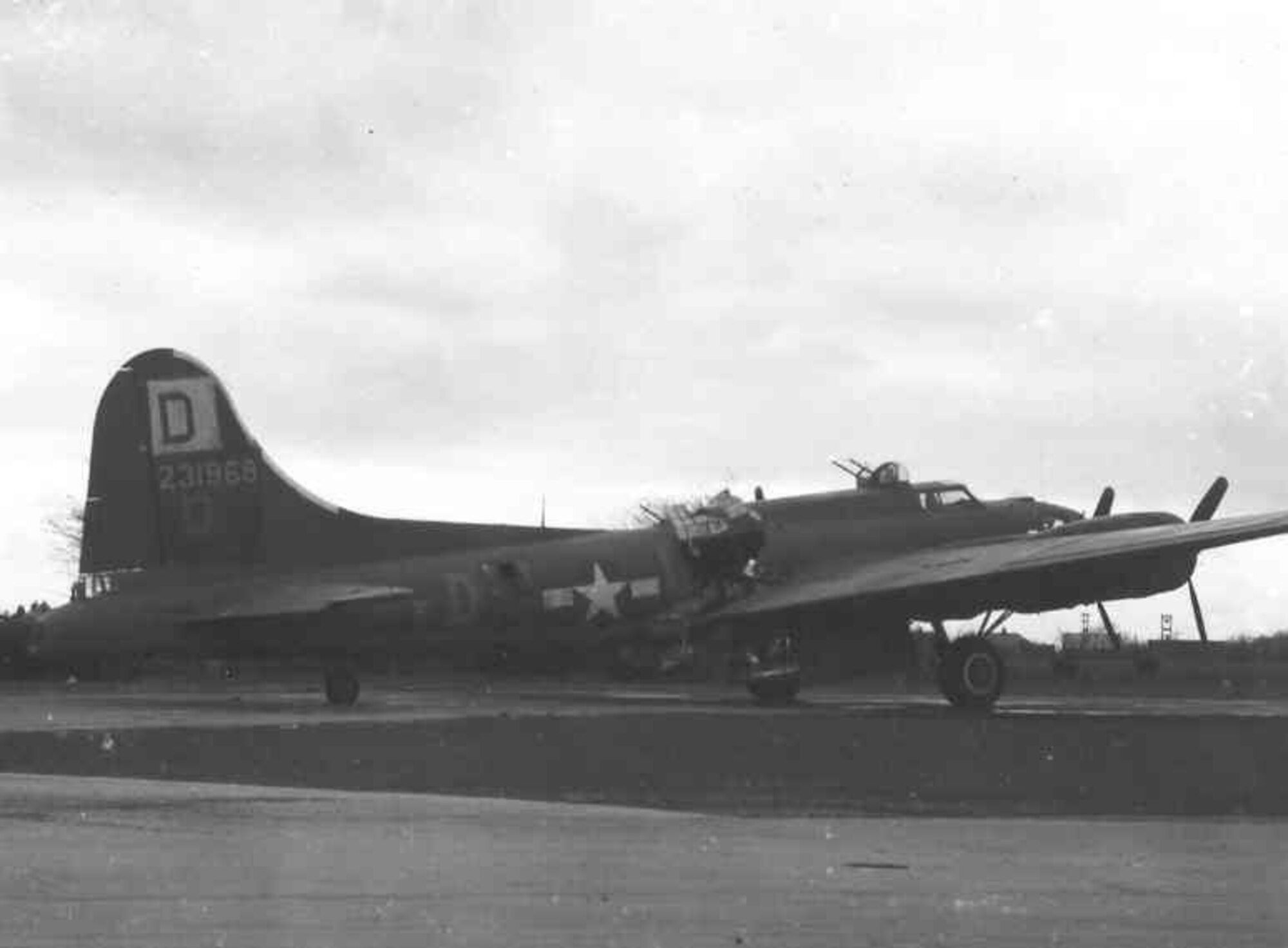 The original “Miss Irish,” B-17 Flying Fortress shows the severe battle damage sustained when an 88 mm flack shell blew a 7-foot by 12-foot hole in the floor, roof and side of the aircraft March 19, 1944. Despite the damage, the aircrew ensured Miss Irish went on to complete the mission, and the pilot, Capt. John P. Gibbons, managed to emergency land the plane at RAF Raydon, Suffolk. (Photo courtesy of 100th Bomb Group Foundation archives)
