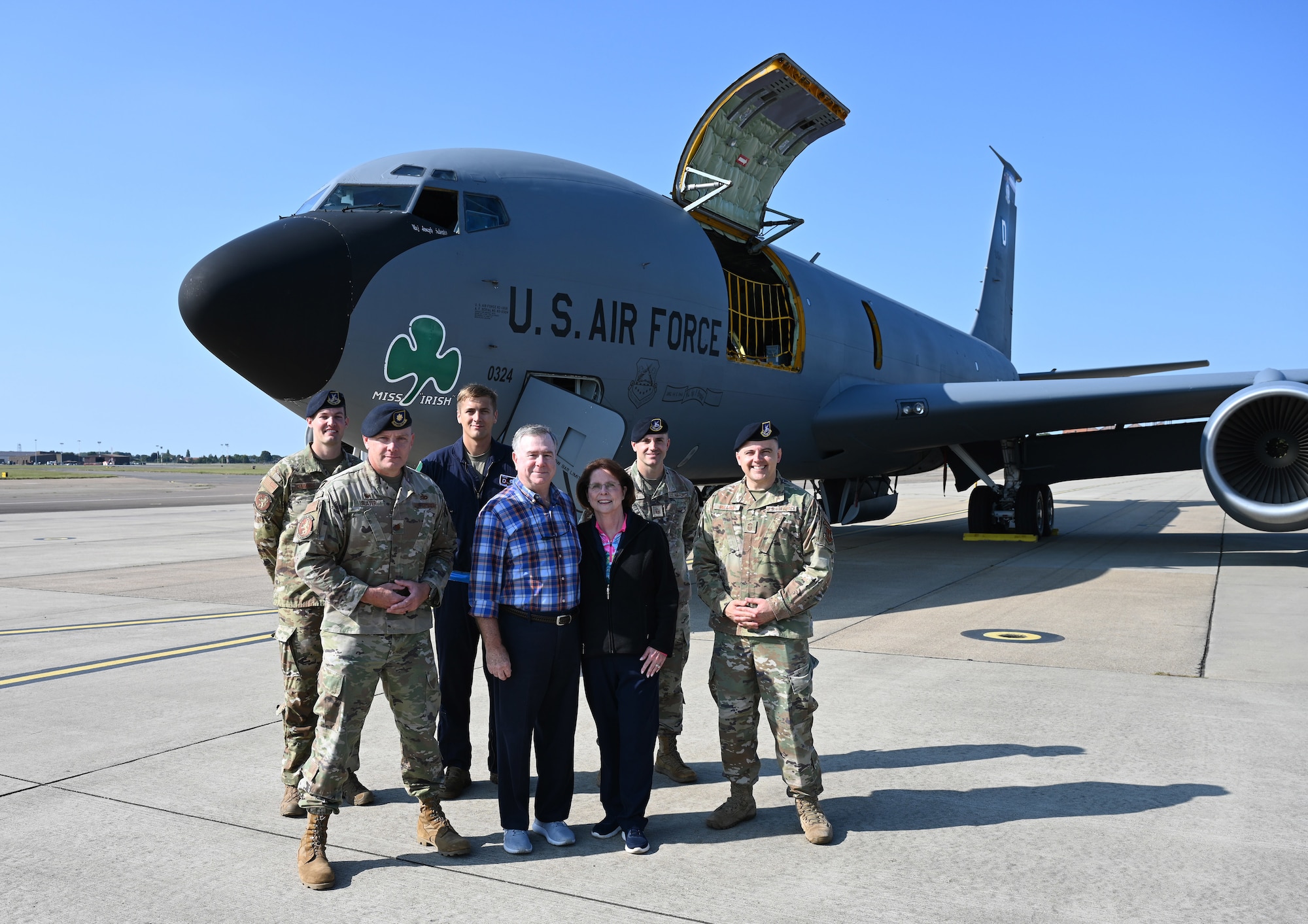 Retired U.S. Navy Capt. Doug Ettus, center, and wife Patti, join leadership and Airmen assigned to the 100th Security Forces Squadron in front of a KC-135 Stratotanker bearing the heritage “Miss Irish” nose art at Royal Air Force Mildenhall, England, Sept. 15, 2023. Ettus’s father, U.S. Army Air Force Staff Sgt. Myron “Ty” Ettus, was a waist gunner on the original Miss Irish – a B-17 Flying Fortress – during World War II. Ty flew out of Thorpe Abbotts, Diss, England, and Doug and his wife travelled to the U.K. to visit Thorpe Abbotts and the 100th Air Refueling Wing to learn more about his father’s time stationed in England. (U.S. Air Force photo by Karen Abeyasekere)
