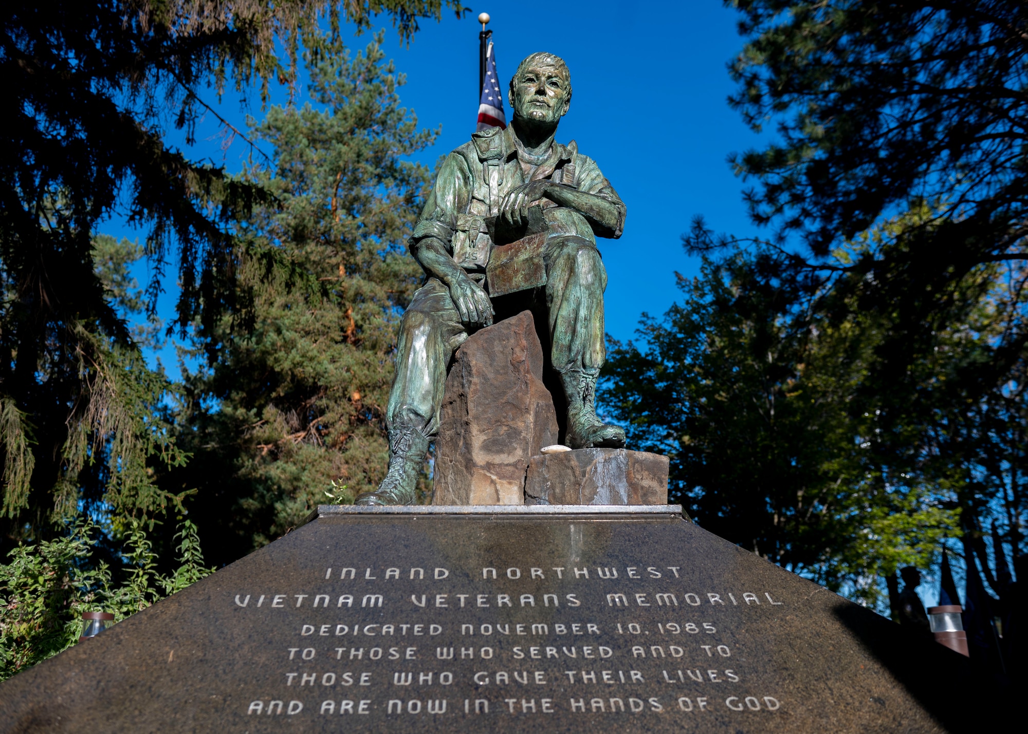 A Vietnam Veteran’s Memorial statue is on display at Riverfront Park in Spokane, Washington, Sept. 14, 2023. Airmen from the 336th Training Group at Fairchild Air Force Base gathered around the Vietnam Veteran’s Memorial before starting a 24-hour ruck march in honor of National POW/MIA Recognition day. The ruck march began on Sept. 14 at the Vietnam Veterans Memorial in downtown Spokane and continued through Airway Heights before concluding at Fairchild AFB. The event culminated with a recognition ceremony on Sept. 15 to honor all American prisoners of war and those Americans still missing in action, as well as their families. Every year, the third Friday in September is recognized in the United States as National POW/MIA Recognition Day. The Department of Defense is steadfast in its commitment to finding, recovering, identifying and repatriating the remains of its heroes who are unaccounted for.  (U.S. Air Force photo by Staff Sgt. Lawrence Sena)