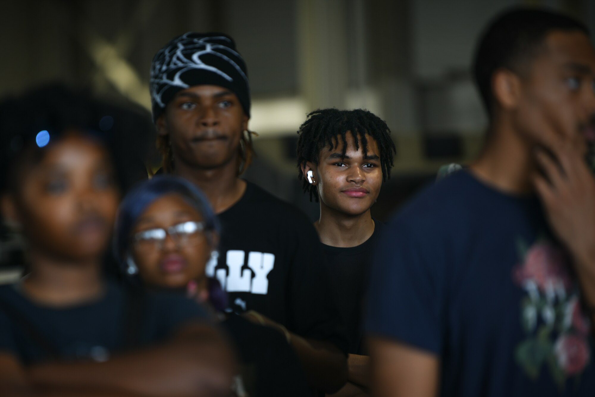 Recruit pays attention during a brief during a tour at Shaw Air Force Base.