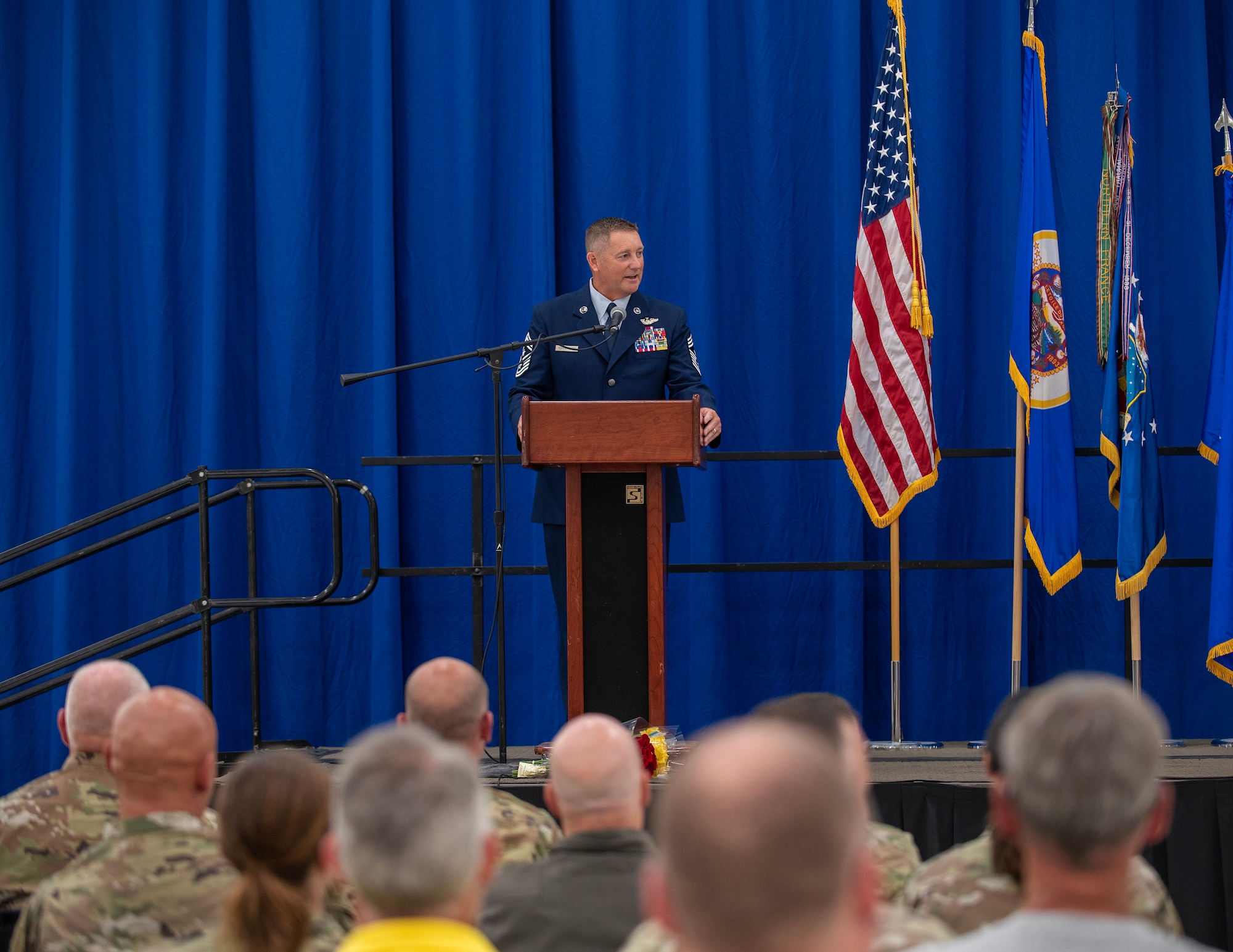 U.S. Air Force Chief Master Sgt. Richard Schumacher receives the duties of Command Chief Master Sgt. of the 133rd Airlift Wing from Col. Jesse Carlson, Commander of the 133rd Airlift Wing in St. Paul, Minn., Sept. 9, 2023.
