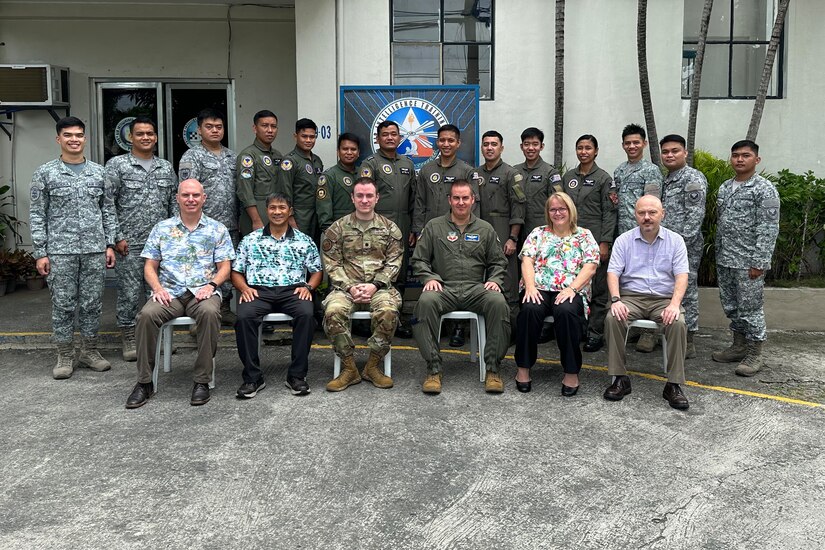 A group of people pose for a photo.