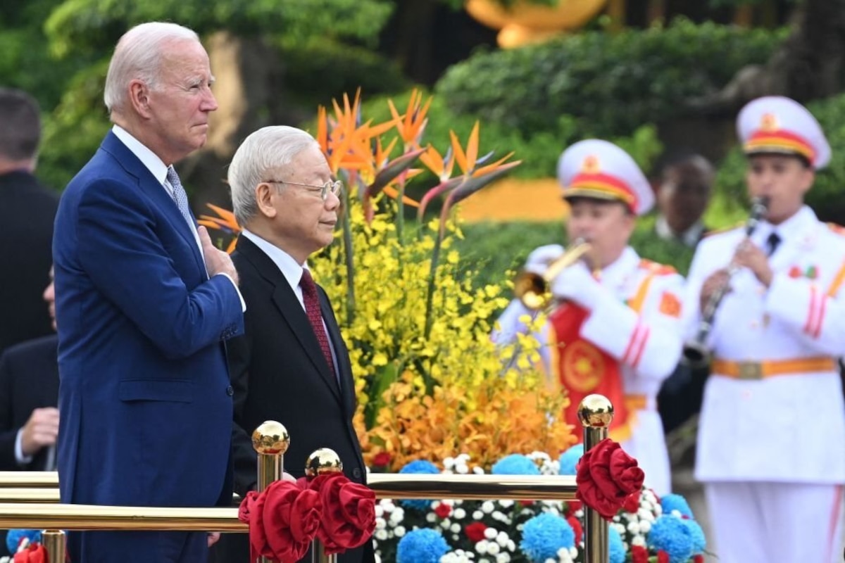 US President Joe Biden attends a welcoming ceremony hosted by Vietnam's Communist Party General Secretary Nguyen Phu Trong (2L) at the Presidential Palace of Vietnam in Hanoi on September 10, 2023. Biden travels to Vietnam to deepen cooperation between the two nations, in the face of China's growing ambitions in the region. (Photo by SAUL LOEB / AFP) (Photo by SAUL LOEB/AFP via Getty Images)