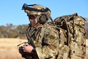 U.S. Air Force Capt. Kyle Hall, 621st Mobility Support Operations Squadron Air Mobility Liaison Officer, prepares to ruck march to the operating location for Exercise Mountain Avenger Oct. 25, 2022, at Fort Carson, Colorado. Exercise Mountain Avenger is the unit’s premier exercise for AMLOs and Expeditionary Air Ground Liaison Elements to prepare for upcoming deployments and contingency operations while showcasing Agile Combat Employment and multi-capable Airmen concepts. (U.S. Air Force photo by Master Sgt. Melissa B. White)