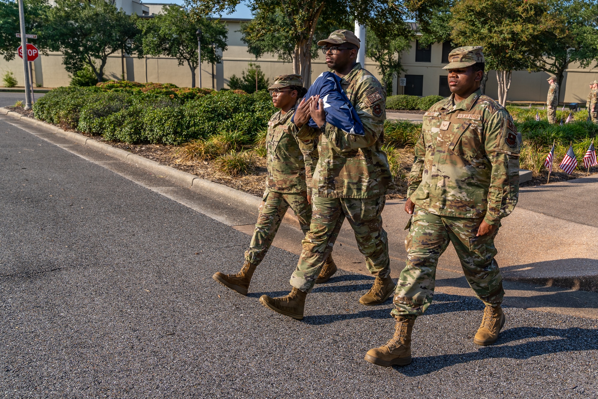 81st Training Wing Airmen march with the national colors during the POW/MIA Retreat ceremony at Keesler Air Force Base, Mississippi, Sept. 15, 2023.
