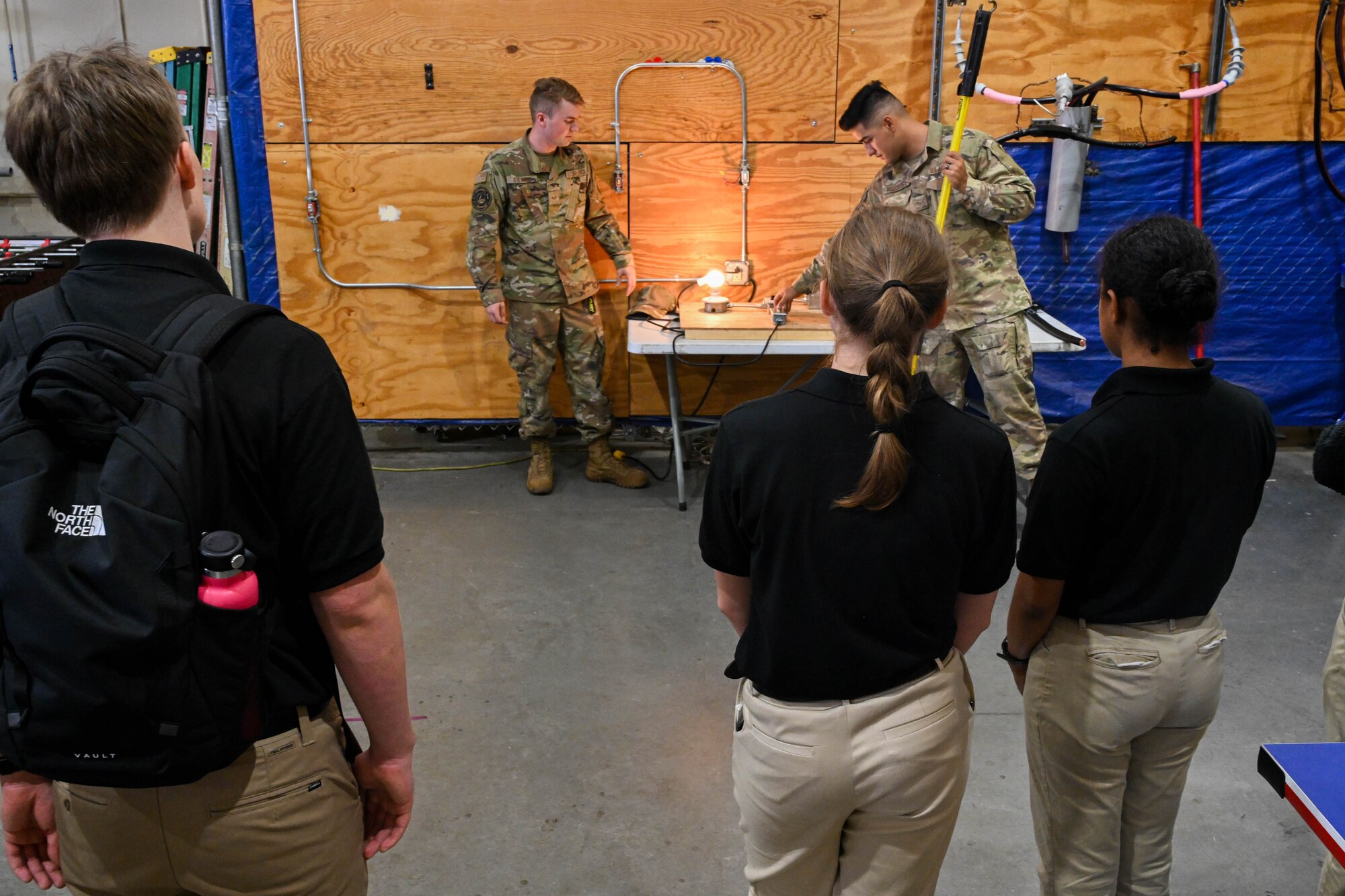 U.S. Air Force Senior Airman James Stevens and Airman 1st Class Sergio Rodriguez, 97th Civil Engineer Squadron electrical journeymen, exhibit an overhead electrical distribution model to Air Force ROTC Det. 845 cadets at Altus Air Force Base, Oklahoma, Sept. 14, 2023. Overhead lines are the most common type of distribution lines and are suspended from poles or towers.
(U.S. Air Force photo by Airman 1st Class Miyah Gray)