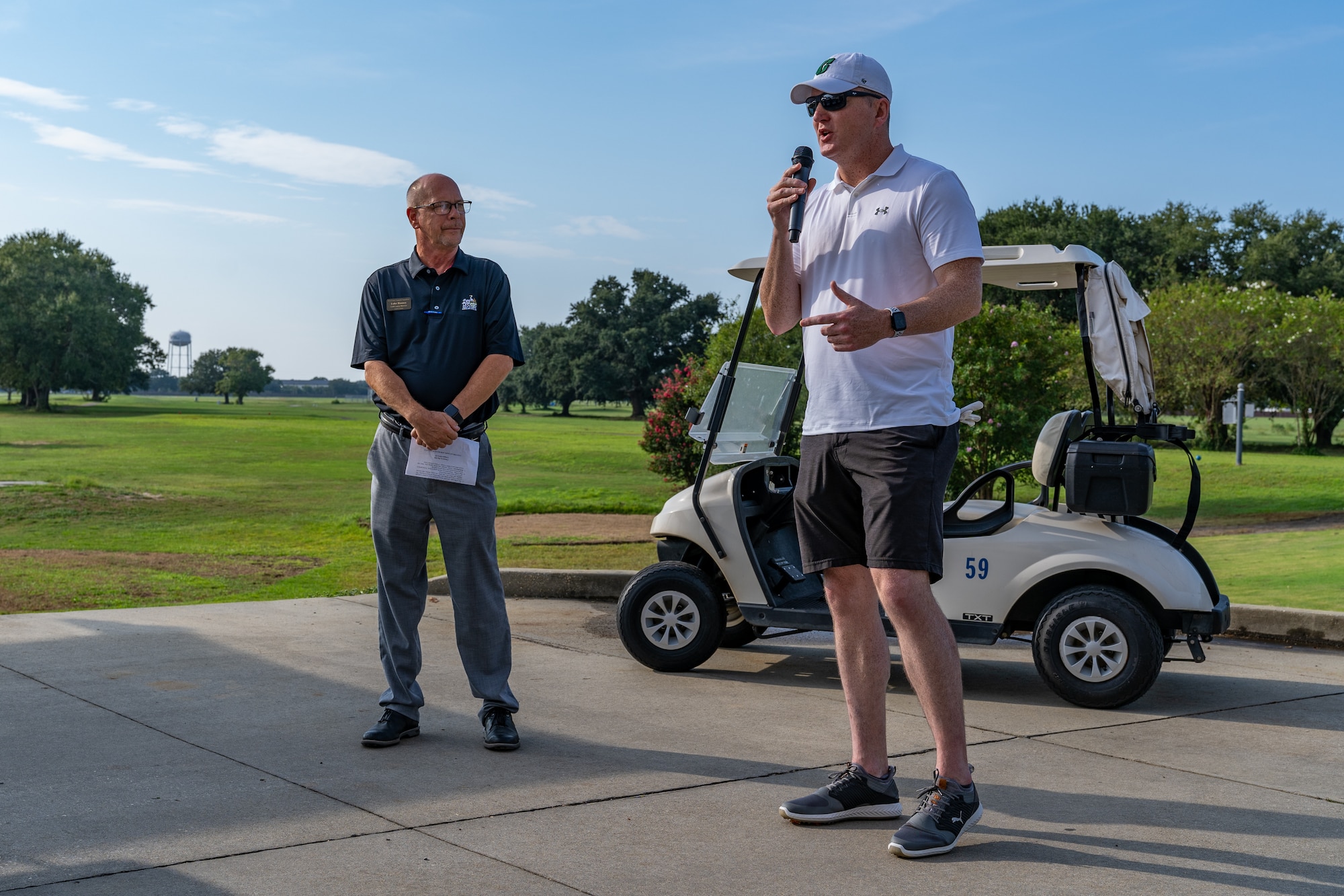 U.S. Air Force Col. Chad Gemeinhardt, 81st Mission Support Group commander, and Luke Rooney, golf center director, welcomes golfers to the annual Don Wylie Golf Tournament at Keesler Air Force Base, Mississippi, Sept. 16, 2023.