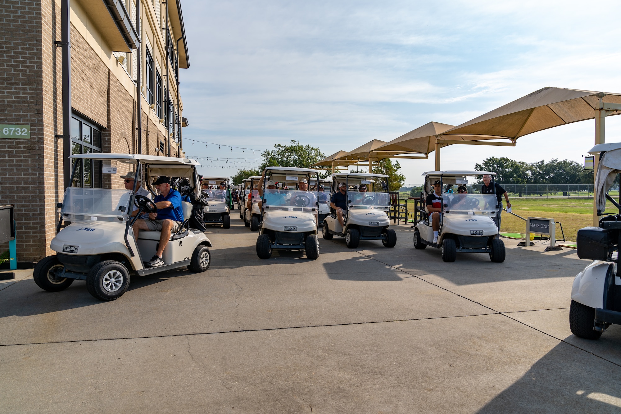 U.S. Airmen and civilians move on to their locations to start the 2023 Don Wylie Golf Tournament at Keesler Air Force Base, Mississippi, Sept. 16, 2023.