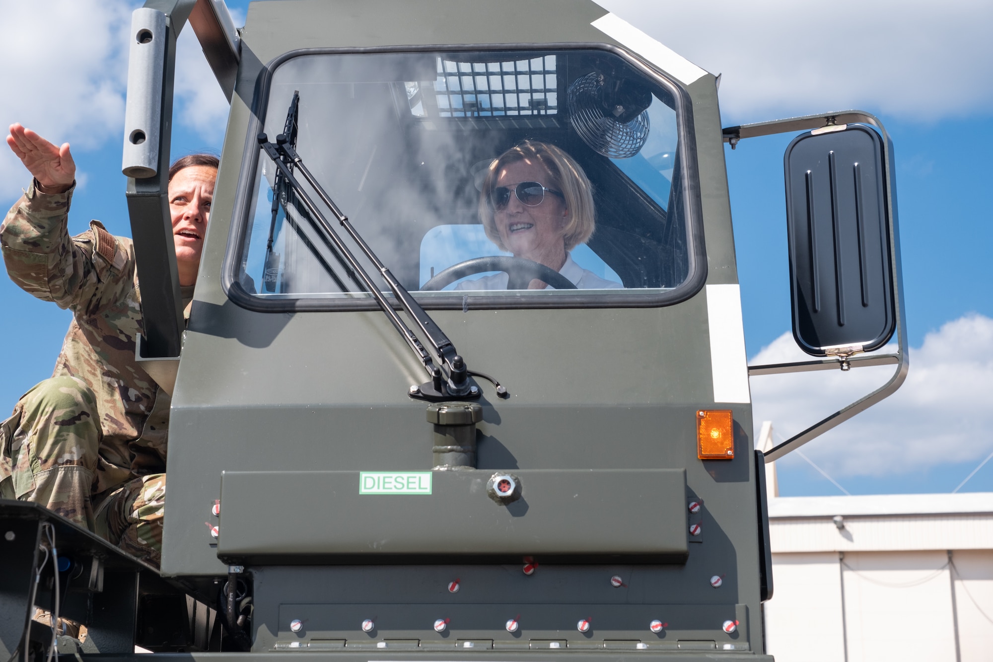 AFRC civic leaders operates a 25K Halvorsen Loader